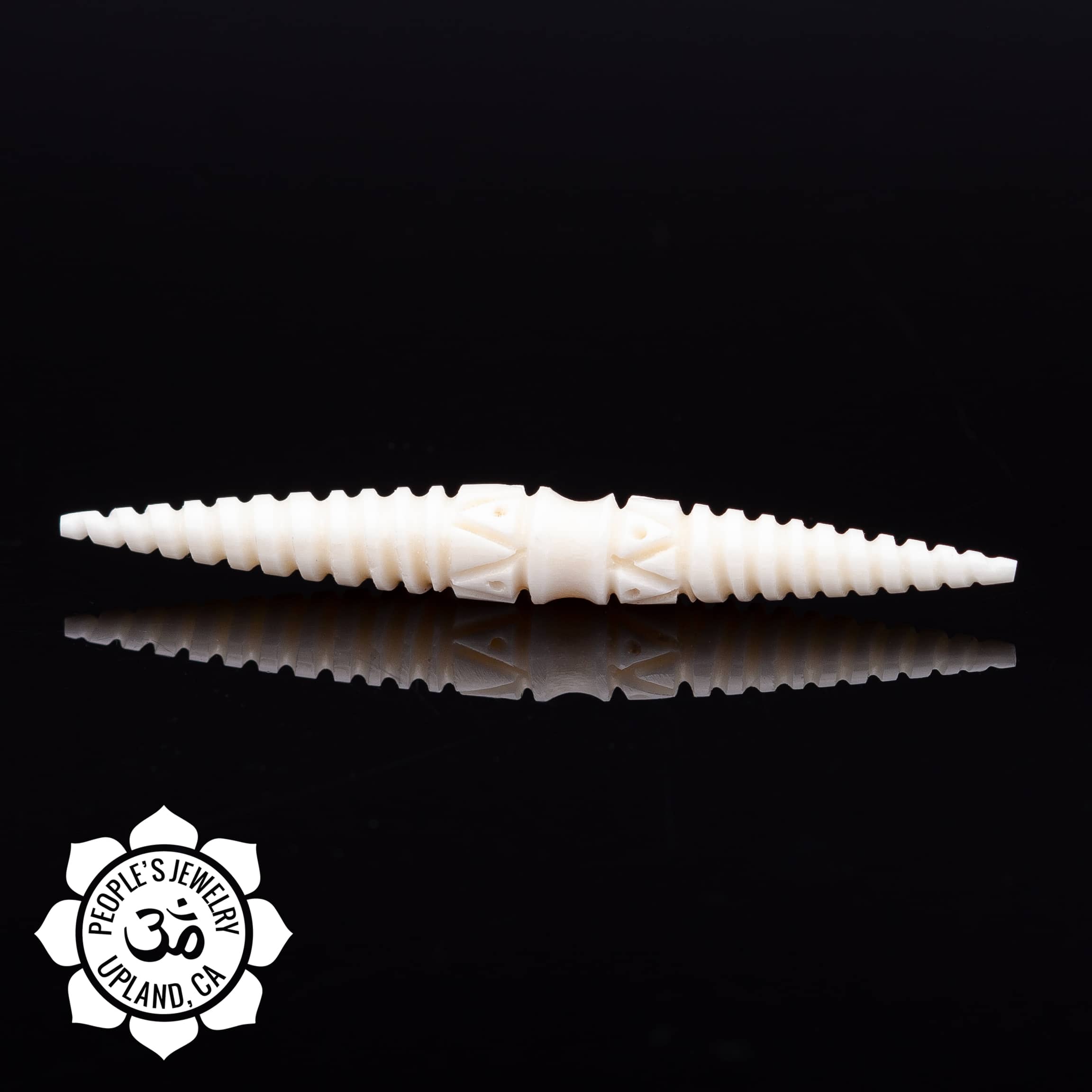 Carved Triangle Bone Spike by Peoples Jewelry