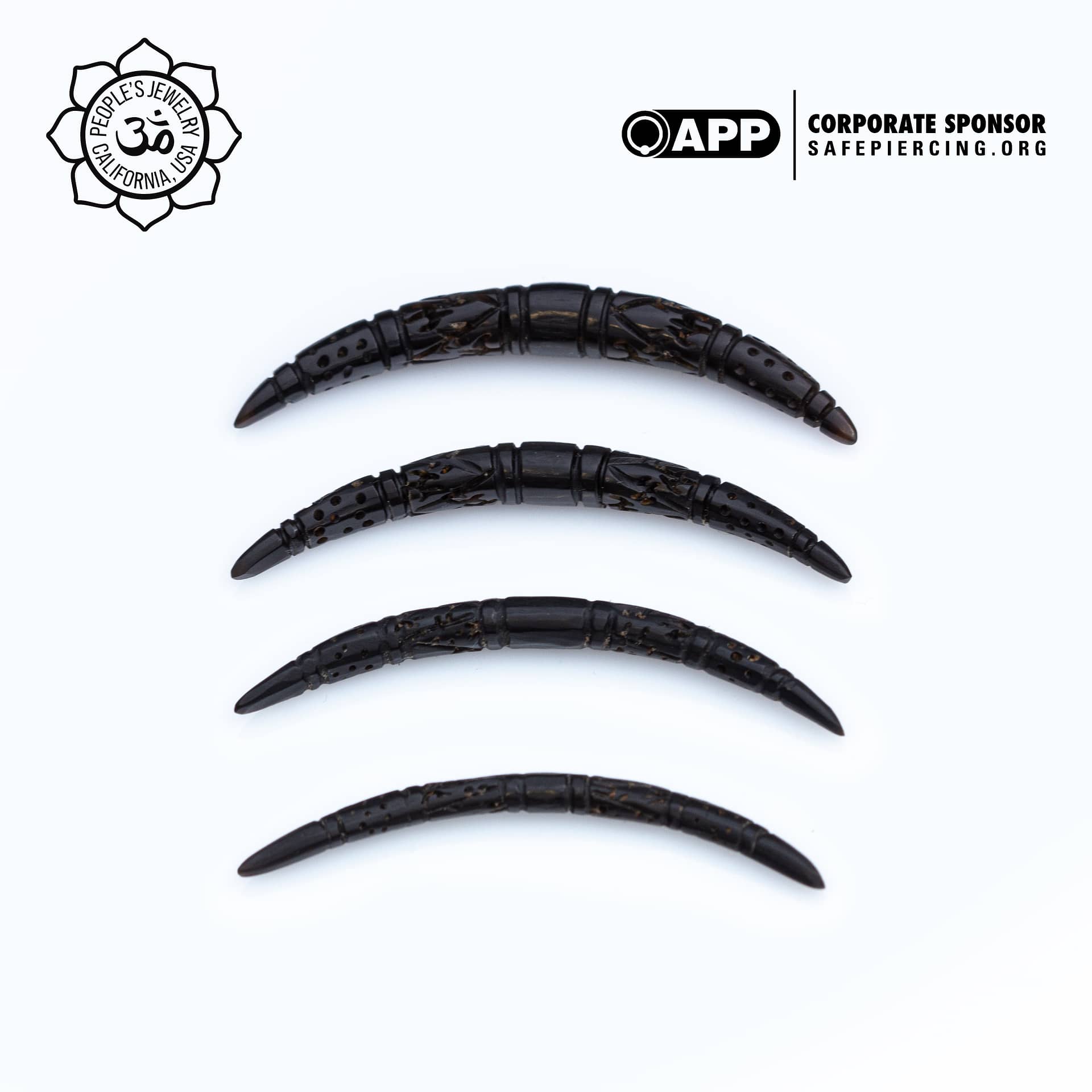 Carved Feather Horn Tusks by Peoples Jewelry