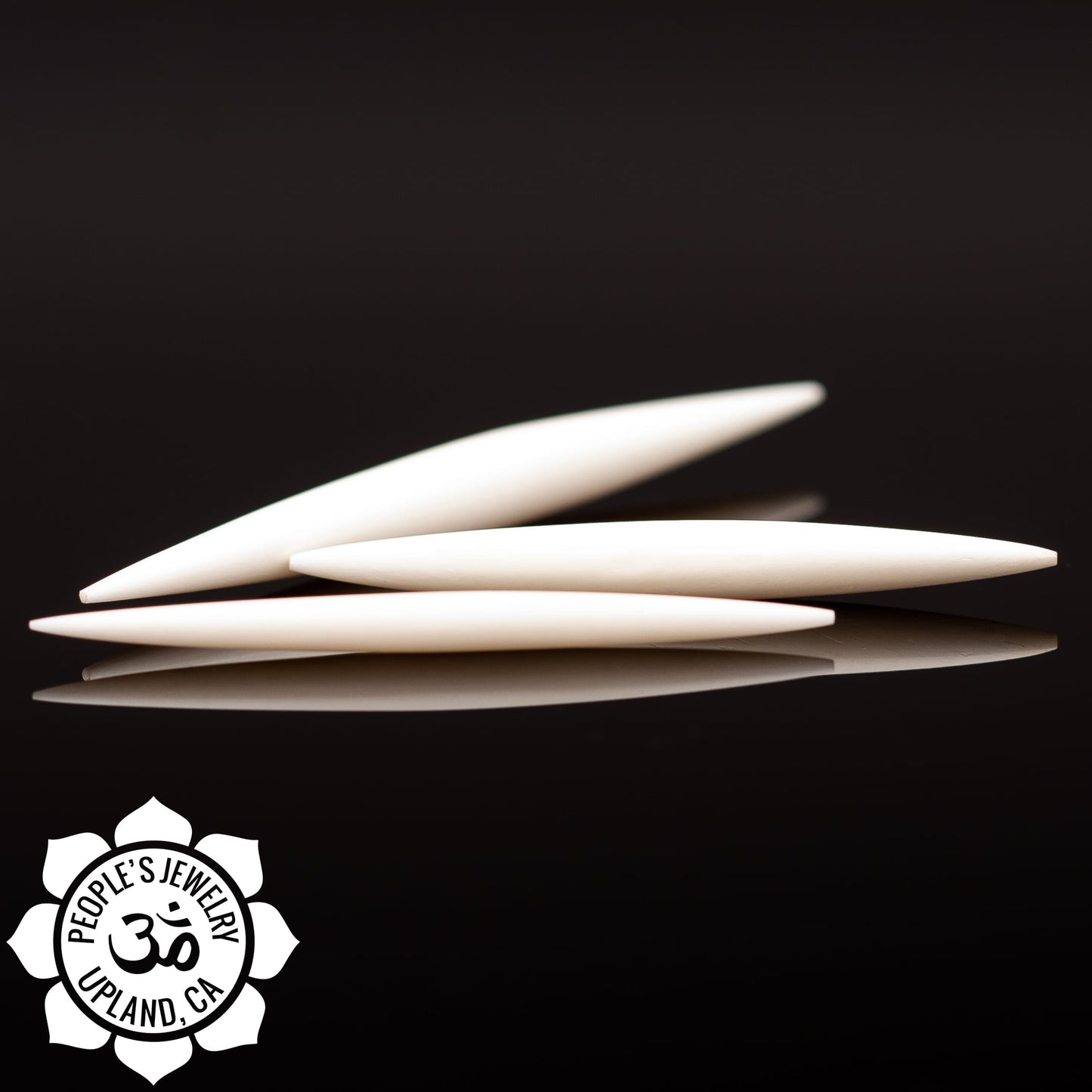 Bone Septum Spikes by Peoples Jewelry