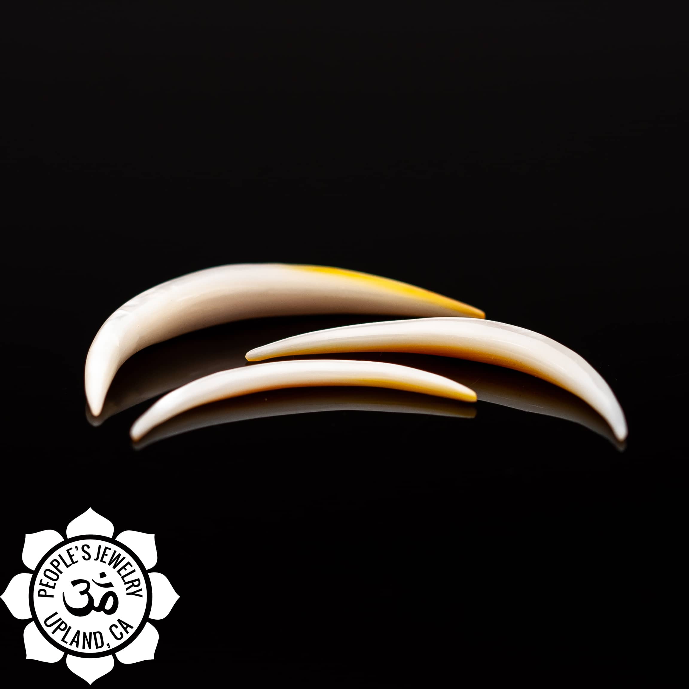 Mother of Pearl Tusks by Peoples Jewelry